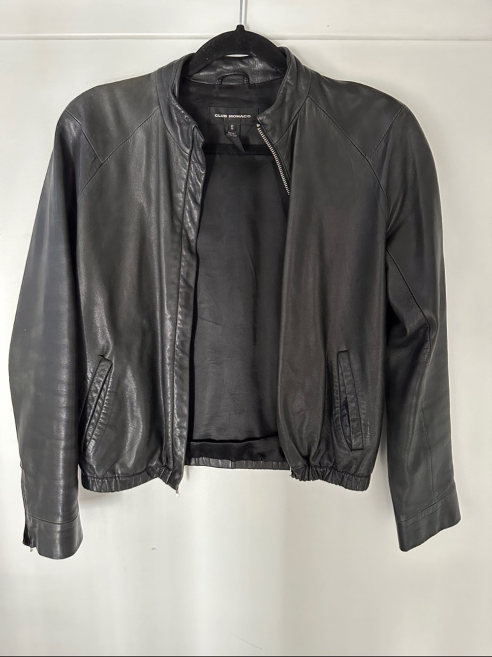 Club Monaco Black Leather Bomber Jacket with Minimalist Silhouette
